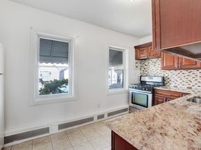 90-31 185TH Street, Hollis NY 11423