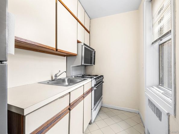 65-74 Saunders Street 1F, Rego Park NY 11374