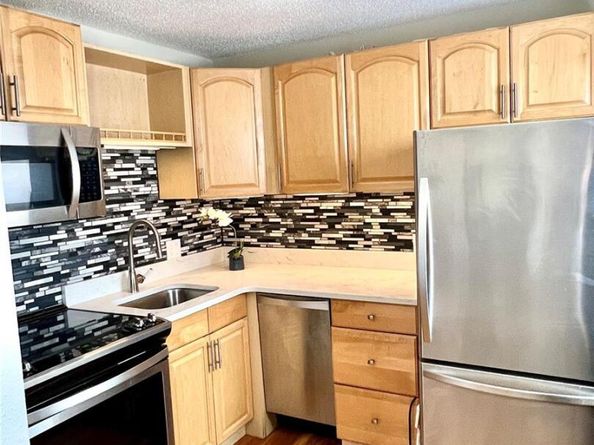 2480 W Caithness Place 8, Denver CO 80211
