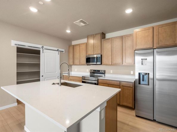 6153 N Ceylon Street 303, Denver CO 80249