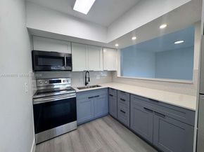 455 Golden Isles Dr 203, Hallandale Beach FL 33009