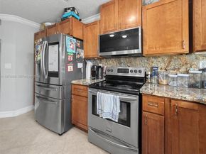 12689 NW 10th Way, Miami FL 33182