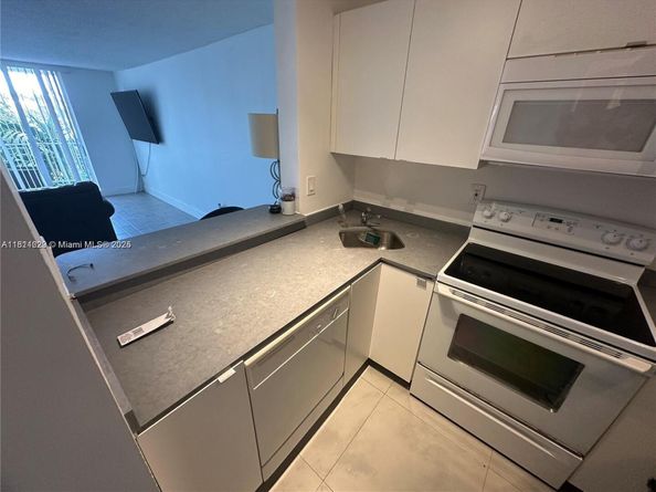 486 NW 165th St Rd B303, Miami FL 33169