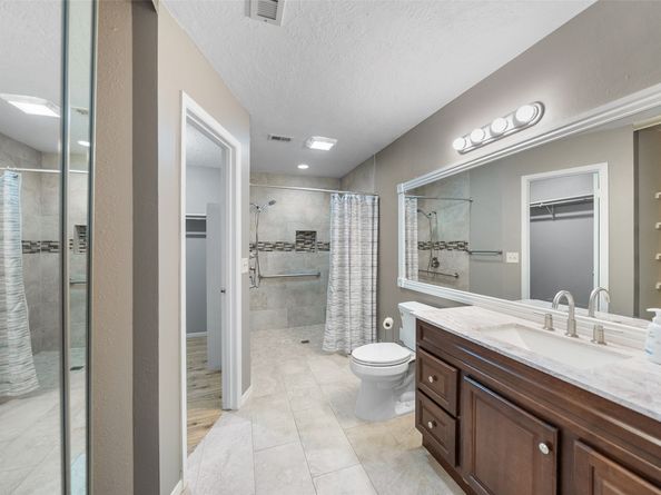 7 Rockridge Court, The Woodlands TX 77381