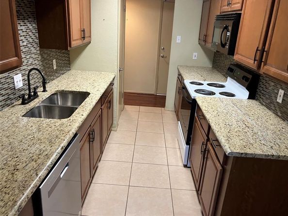 6036  Birchbrook Drive  131, Dallas Texas 75206