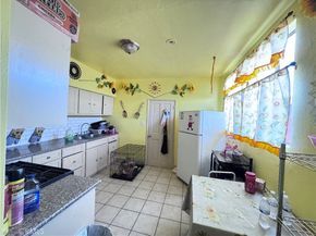 7011 Bonsallo Avenue, Los Angeles CA 90044