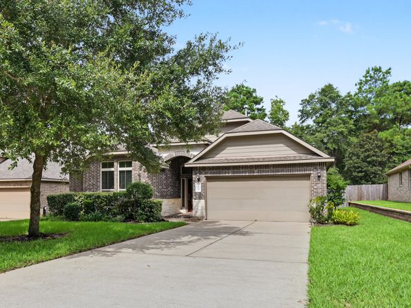 1954 Honey Laurel Drive, Conroe TX 77304