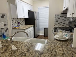 9107 Braeburn Valley Drive 15, Houston TX 77074