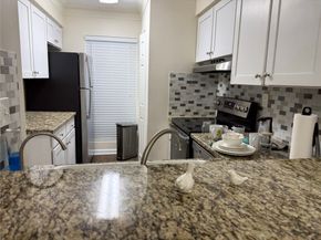 9107 Braeburn Valley Drive 15, Houston TX 77074