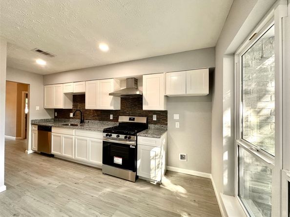 11703 Cliveden Drive, Houston TX 77066