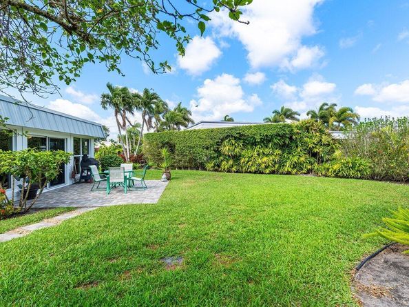 401 French Royale Circle, Atlantis FL 33462