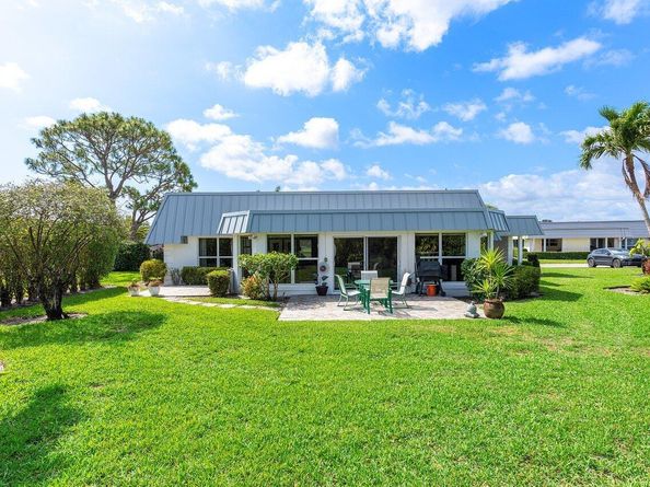 401 French Royale Circle, Atlantis FL 33462