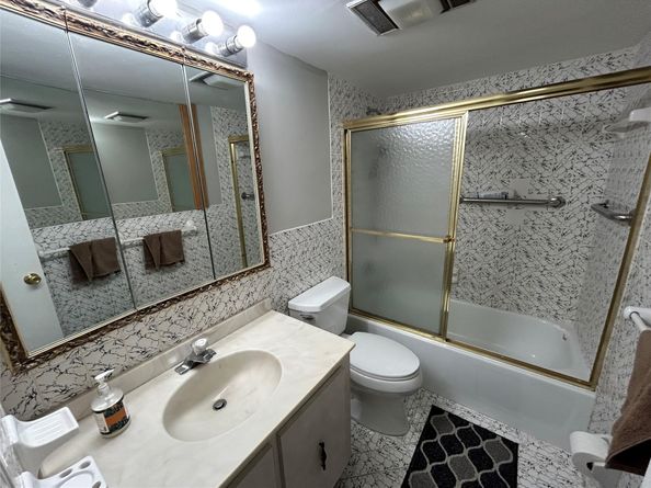 8400 W Sample Rd 102, Coral Springs FL 33065