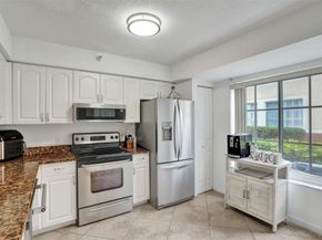 127 Yacht Club Way 112, Hypoluxo FL 33462