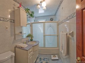 71-28 66th Drive, Middle Village NY 11379