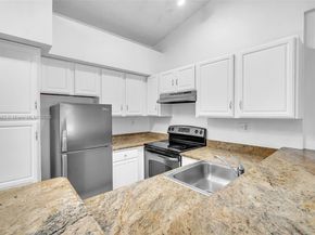 811 Lyons Rd 20203, Coconut Creek FL 33063