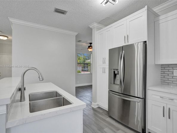 12205 NW 56th Ct, Coral Springs FL 33076