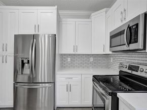 12205 NW 56th Ct, Coral Springs FL 33076