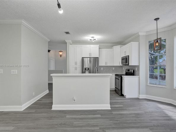 12205 NW 56th Ct, Coral Springs FL 33076