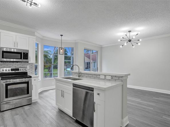 12205 NW 56th Ct, Coral Springs FL 33076