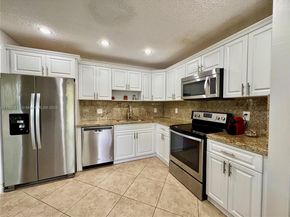 4850 Grapevine Way, Davie FL 33331