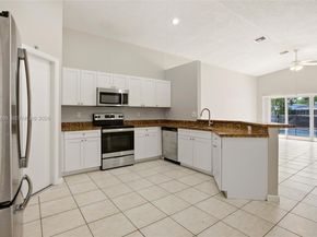1414 E Harmony Lake Cir, Davie FL 33324