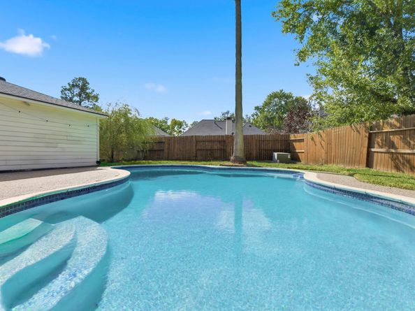 4534 Brook Shadow Drive, Houston TX 77345