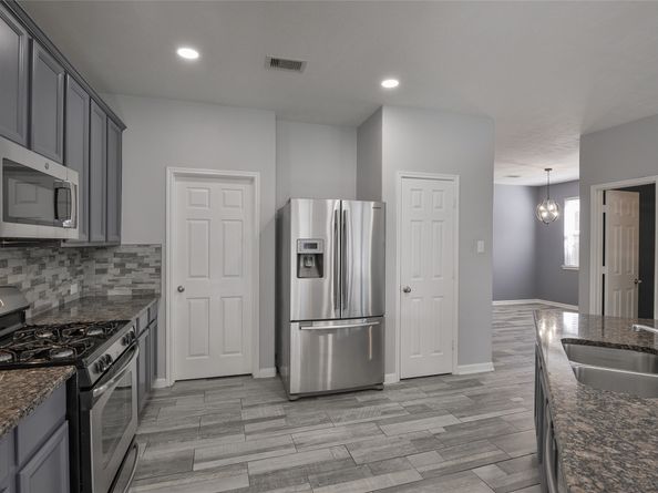 8726 Rolling Rapids Road, Humble TX 77346