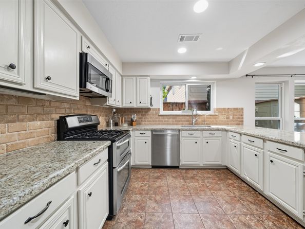 215 E Rainbow Ridge Circle, Spring TX 77381