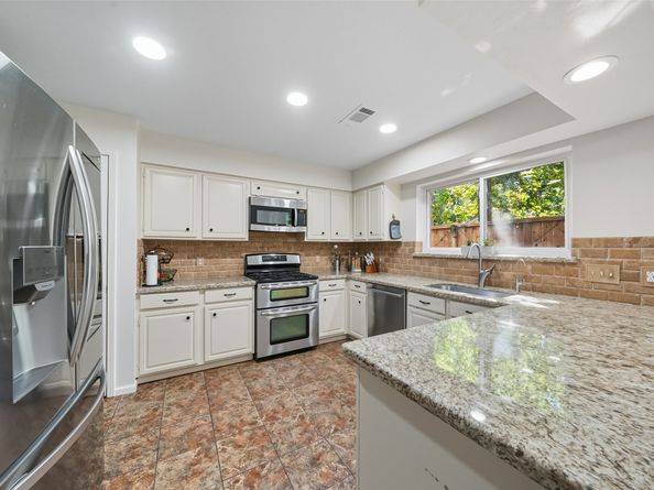 215 E Rainbow Ridge Circle, Spring TX 77381