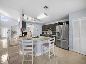 126 Hammocks Court, Greenacres FL 33413