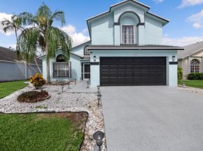 126 Hammocks Court, Greenacres FL 33413