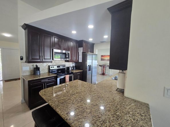 242 Las Palmas Street, Royal Palm Beach FL 33411