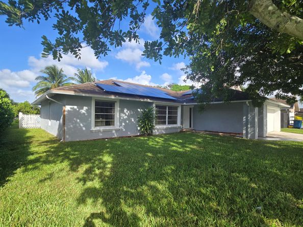 242 Las Palmas Street, Royal Palm Beach FL 33411
