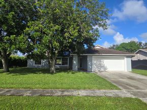 242 Las Palmas Street, Royal Palm Beach FL 33411