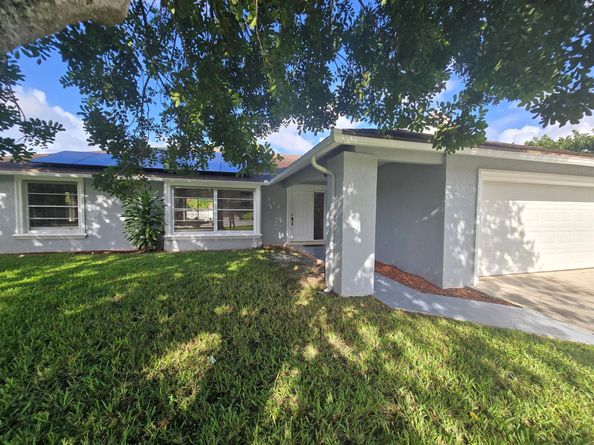 242 Las Palmas Street, Royal Palm Beach FL 33411