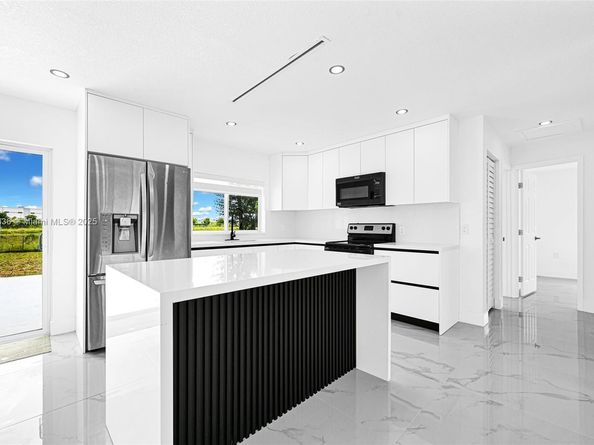 4521 NW 207th Dr, Miami Gardens FL 33055