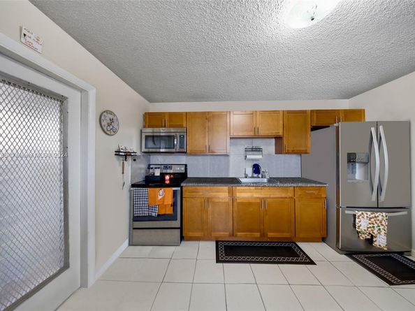 1211/1213 NW 32 Pl, Miami FL 33125