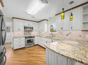 3762 S Benton Way, Denver CO 80235