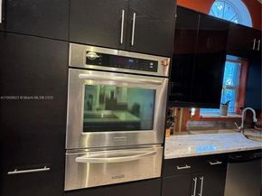 1411 Seagrape Cir, Weston FL 33326