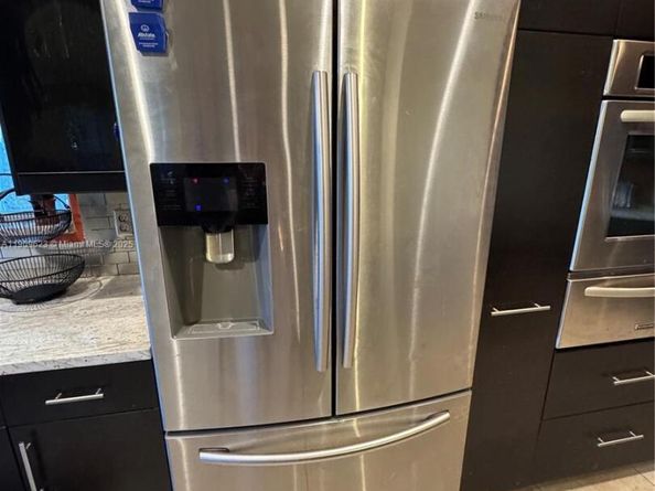 1411 Seagrape Cir, Weston FL 33326