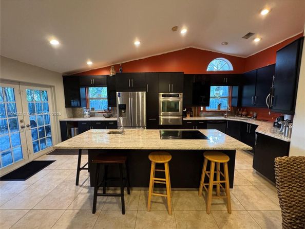 1411 Seagrape Cir, Weston FL 33326