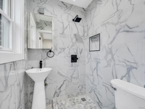 38-22 56 Street, Woodside NY 11377