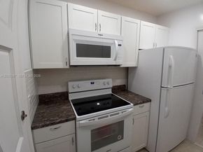 1250 E Sample Road 303, Pompano Beach FL 33064