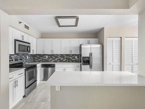 7580 Regency Lake Drive 402, Boca Raton FL 33433