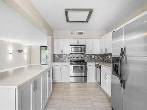 7580 Regency Lake Drive 402, Boca Raton FL 33433