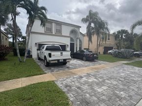 2761 Misty Oaks Cir, Royal Palm Beach FL 33411