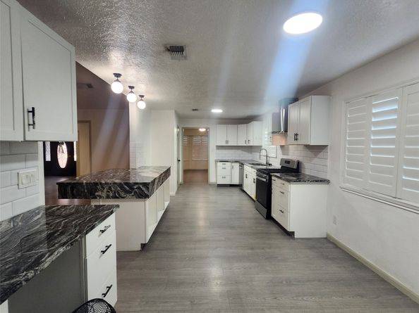 1306 Trailwood Village Drive, Houston TX 77339