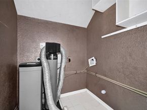 19 S Scarlet Elm Court, The Woodlands TX 77382