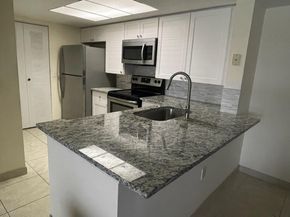 5045 Wiles Road 308, Coconut Creek FL 33073